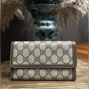Gucci GG Supreme tri-fold wallet